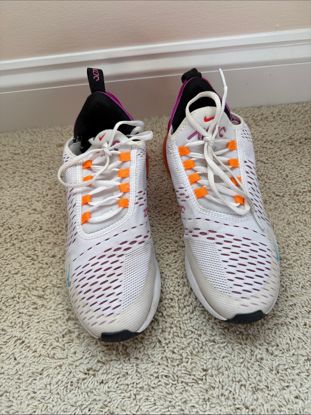 Nike Women’s White Athletic Sneakers with Orange and Pink Accents